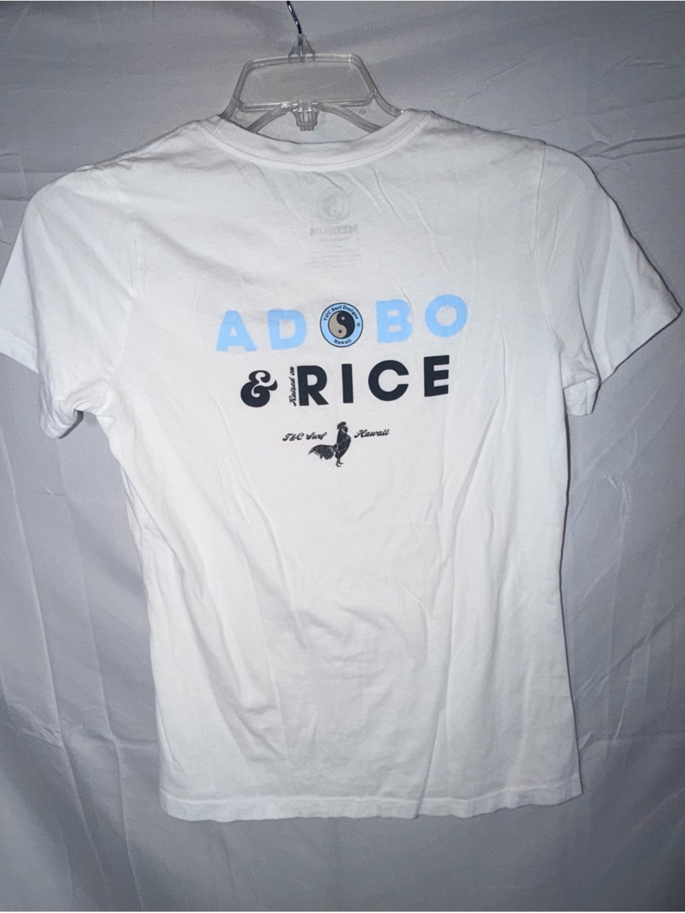 T&C Surf Hawaii with Adobo & Rice graphic white tshirt